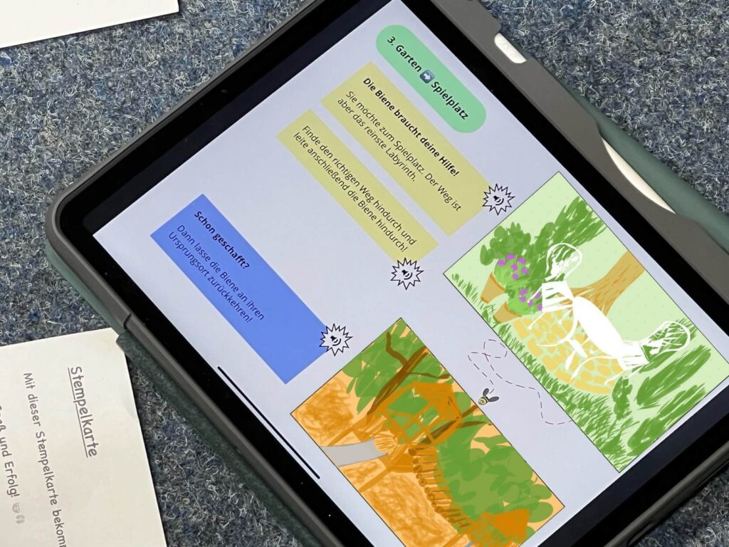Zusehen ist ein Tablet welches auf dem Teppichboden liegt, auf dem die Datei des Station 3 geöffnet ist.